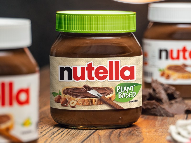 Ein Glas vegane Nutella mit grünem Deckel und grünem 